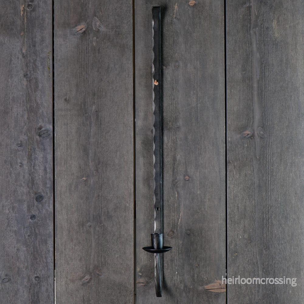 Väggljusstake i järn Väggljusstake i järn