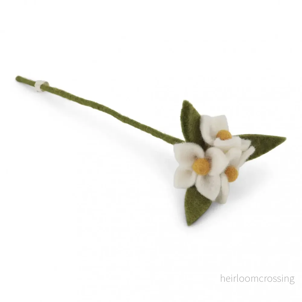 Tovade blommor på stjälk Tovade blommor på stjälk