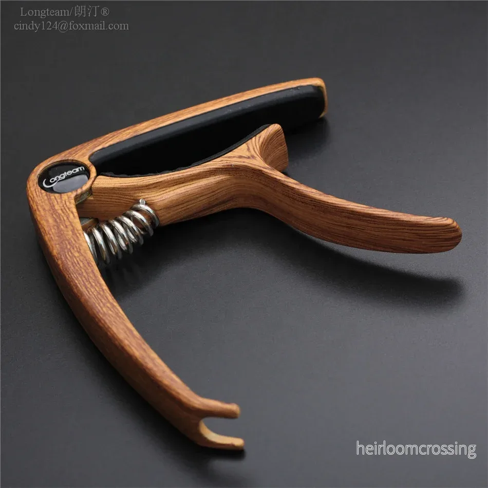 Capo för ukulele/gitarr