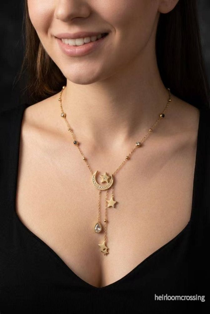 Halsband med måne och stjärnor i rostfritt stål Halsband med måne och stjärnor i rostfritt stål