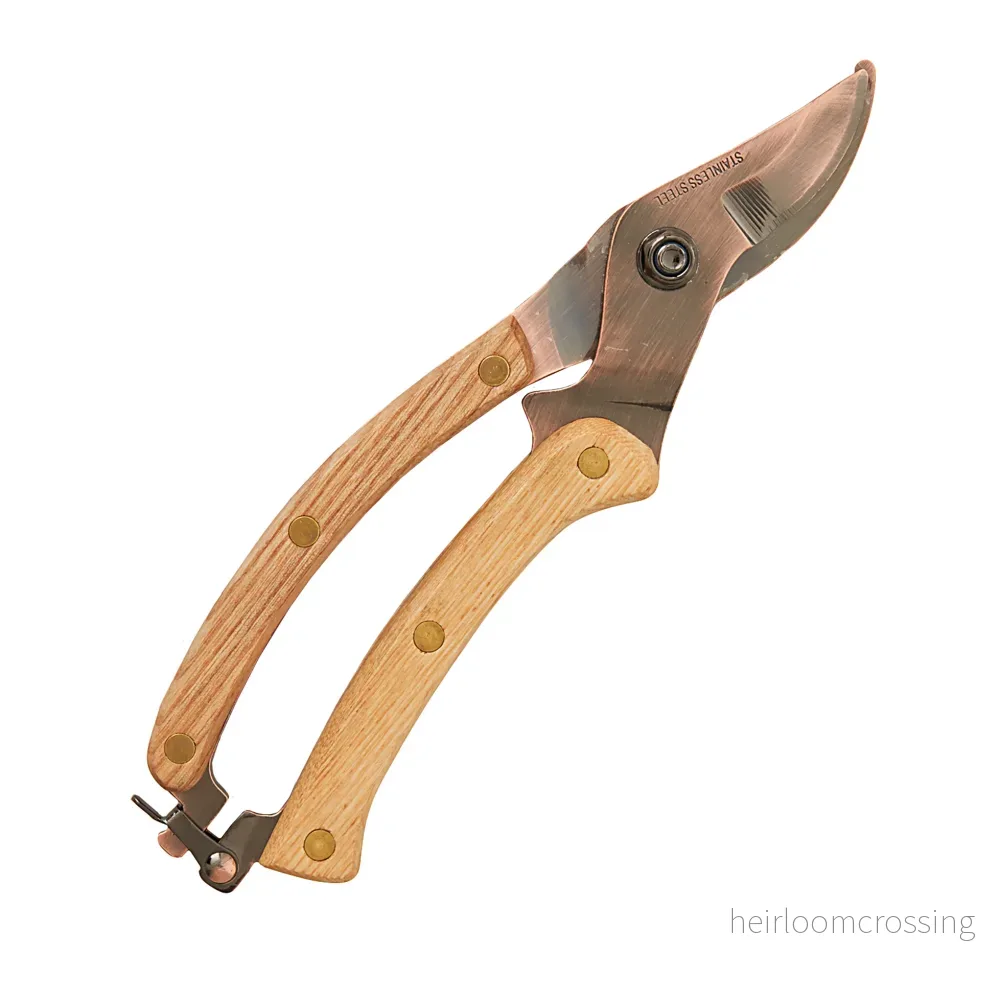 Beskärsax (trähandtag och koppar) Beskärsax (trähandtag och koppar)